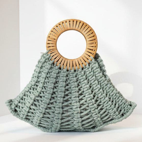 Solid sage green macramé bag with round rattan handle